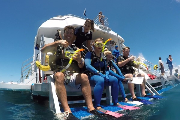 passengers snorkeling Passengers on yatch platform equipped for snorkeling