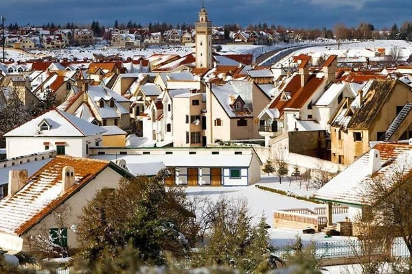 Ifrane Under the Snow A view of snow-covered Ifrane along the route from Fes to the Merzouga Desert