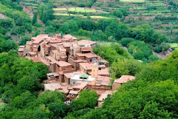 Tamatert on the 3-Day Berber Villages Hike The Berber village of Tamatert, surrounded by green terraces in the High Atlas Mountains
