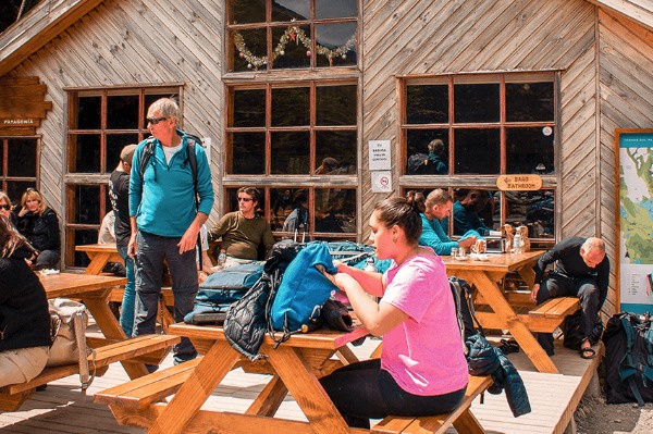Camping Sector Chileno outdoor terrace of the chilean sector at torres del paine with hikers resting