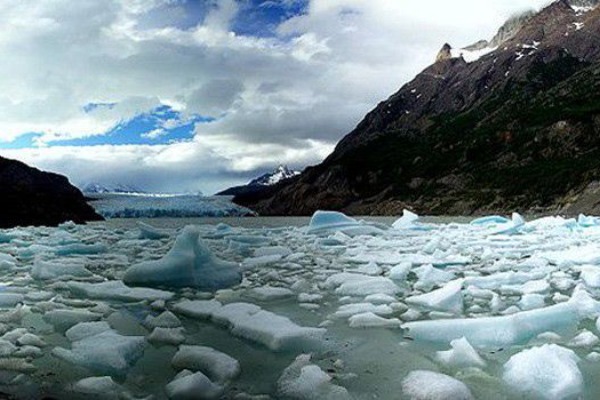 Grey lake and floating ice