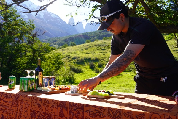 staff preparing dinner staff boy preparing dinner at Pehoe campsite