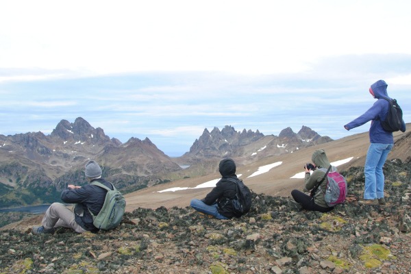 Views from Cerro Bandera summit People bundled up at the summit taking photos of the landscape