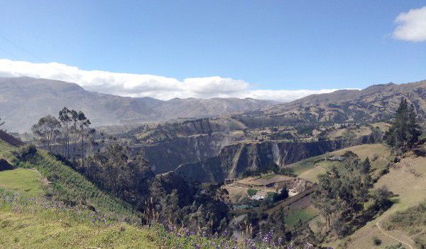 Views of canyons and Andean fields on the way to the Quilotoa Lagoon.
