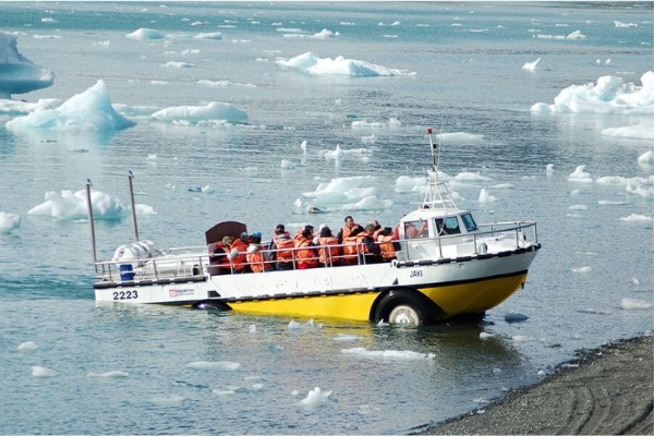 back to the starting point amphibious boat coming out of the water on the shore of Jökulsárlón lagoon