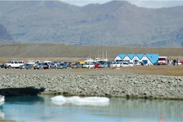 meeting point at Jökulsárlón cars parked on the esplanade next to the cafeteria at the Jökulsárlón glacier lagoon.