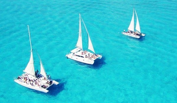 several catamarans to isla mujeres
