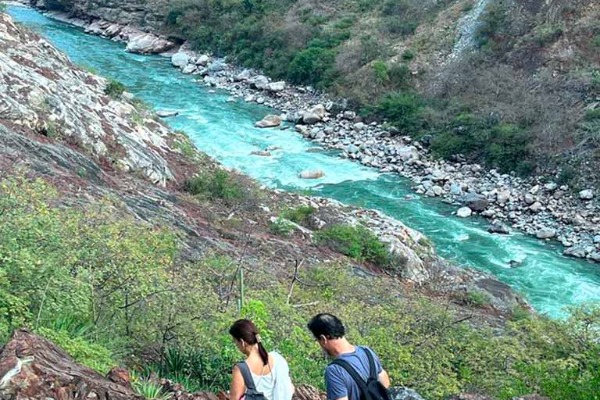 people walking along the Apurimac River