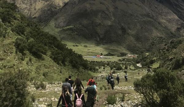 Travelers walking in Peru