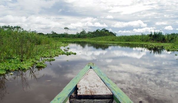 wooden boat navigating on the Ucayali river