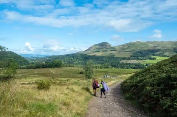 women traversing hills women traversing WHW hills
